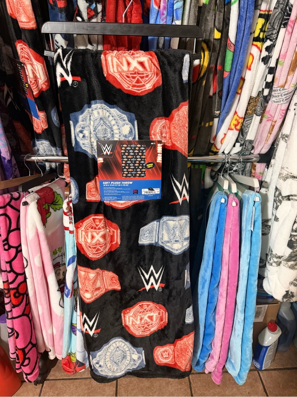 WWE Black Plush Throw Blanket with Red and Light Gray Championship Badges